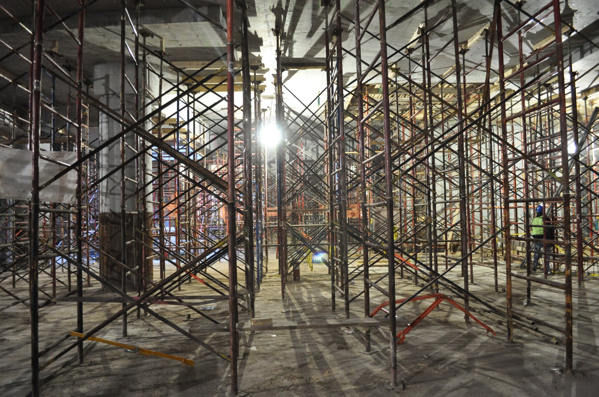 Frame shoring towers carry the formed deck above